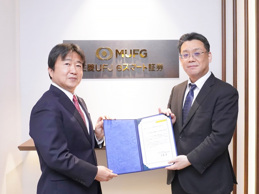 飛松社長、日証協の石津知則社会連携本部長